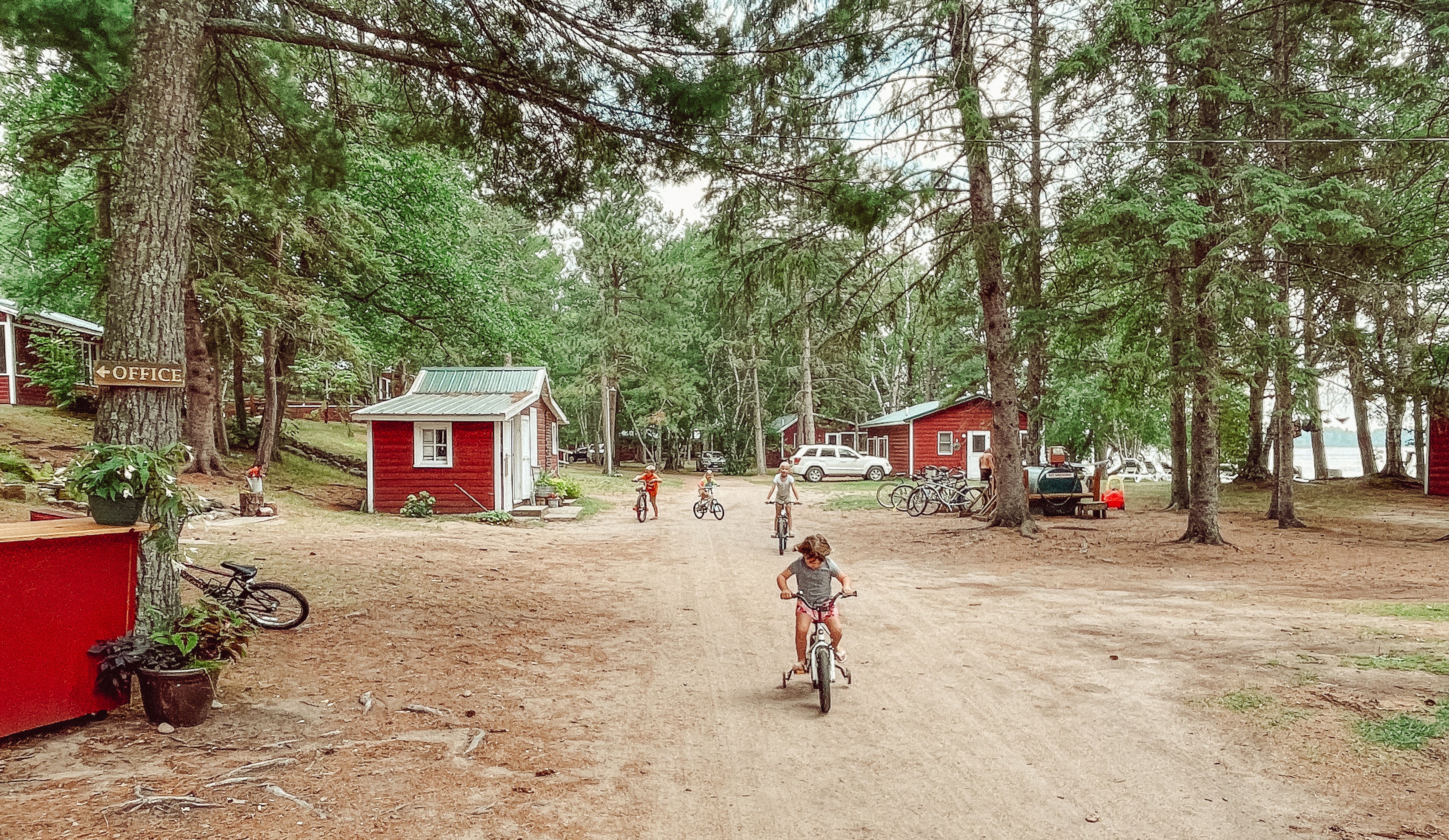 Kids biking at Two Inlets Resort