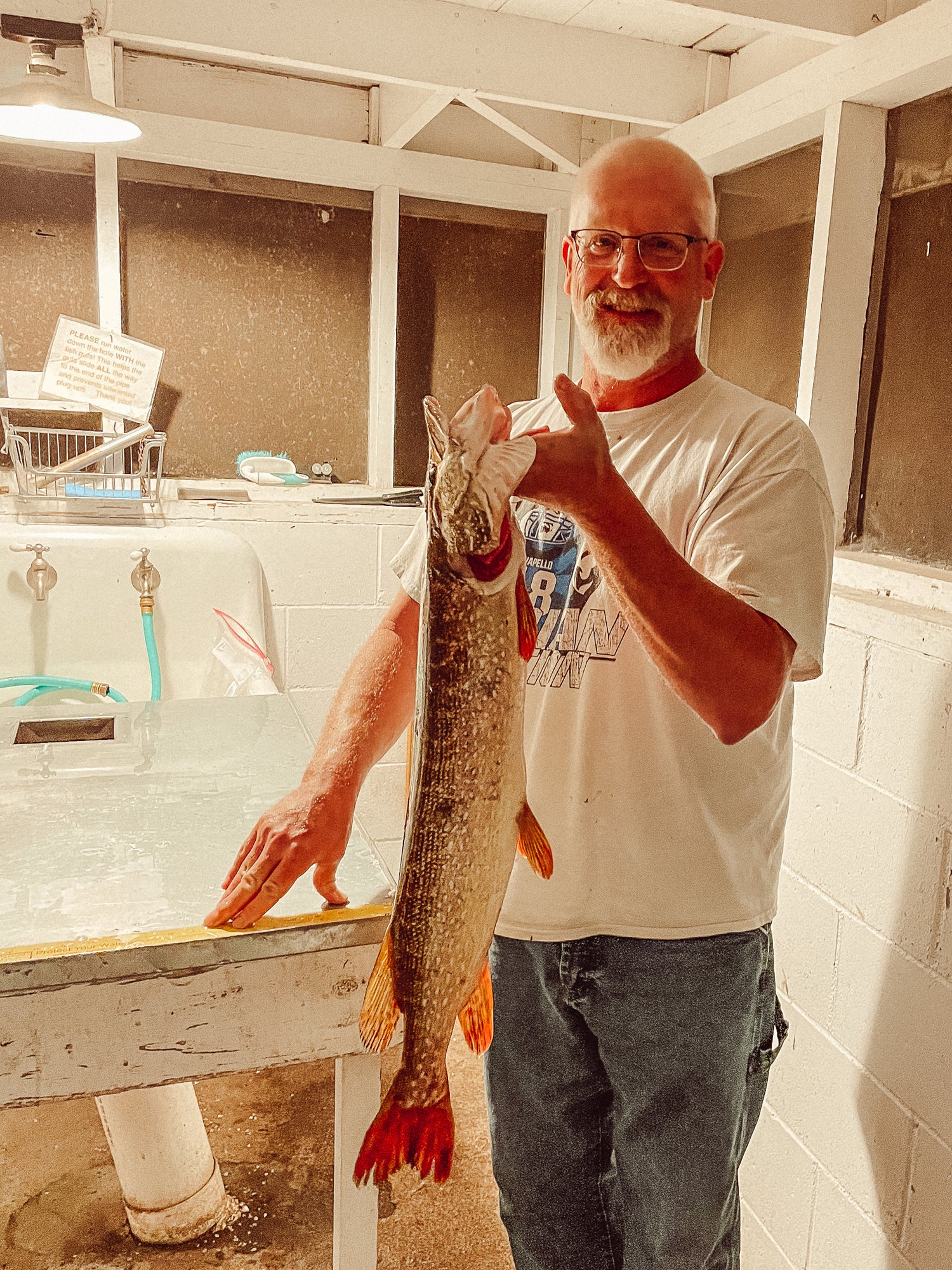 northern pike in fish cleaning house